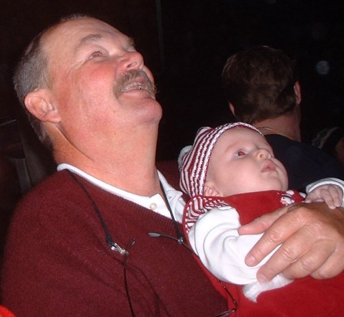 Sean and his grandpa watch the fireworks