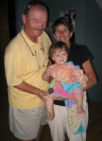 Grandma and Grandpa with their lil' swimmer