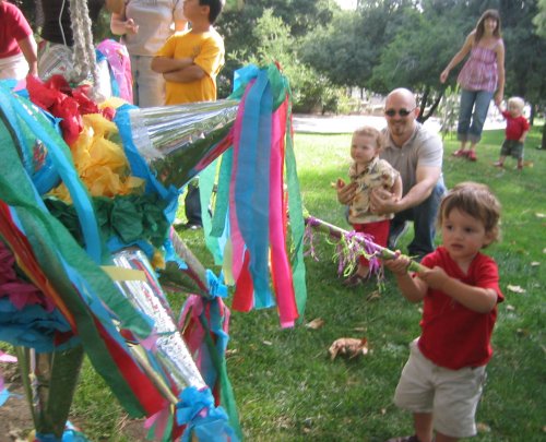 Sean takes a whack while Theo and Owen look on