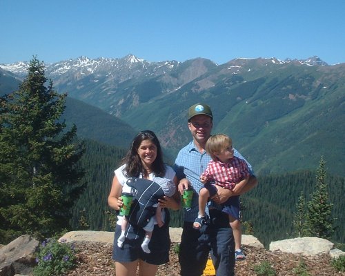 The Parkers on top of the mountain over Aspen